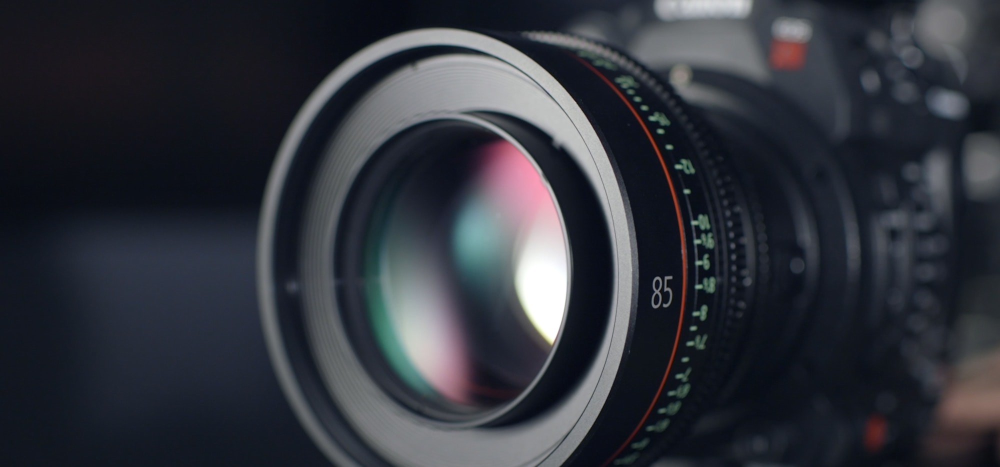 Close-up of a black cinema camera prime lens