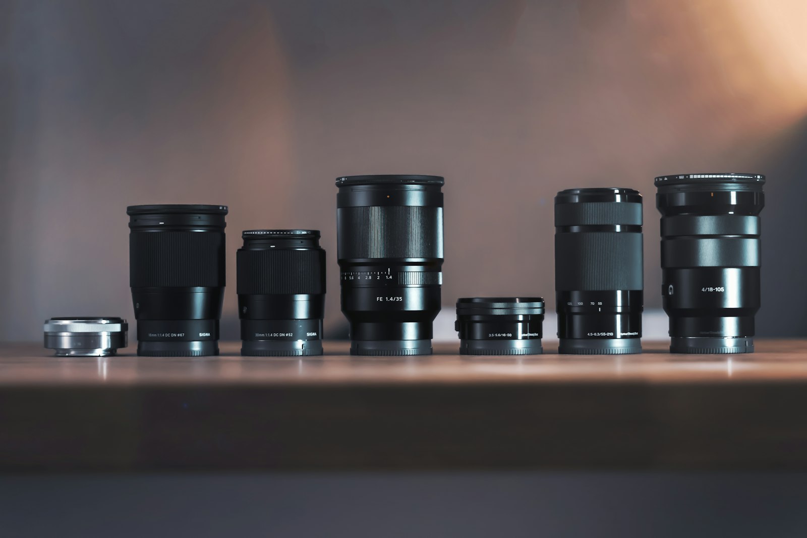 A collection of camera lenses of different focal lengths
